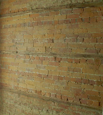 Painted interior brick before cleaning